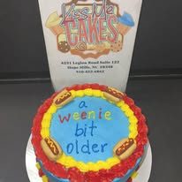 Colorful birthday message cake from Kiss Me Cakes