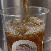 Fresh flavored soda being poured at Kiss Me Cakes