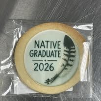 Native Graduate 2026 decorated cookie from Kiss Me Cakes